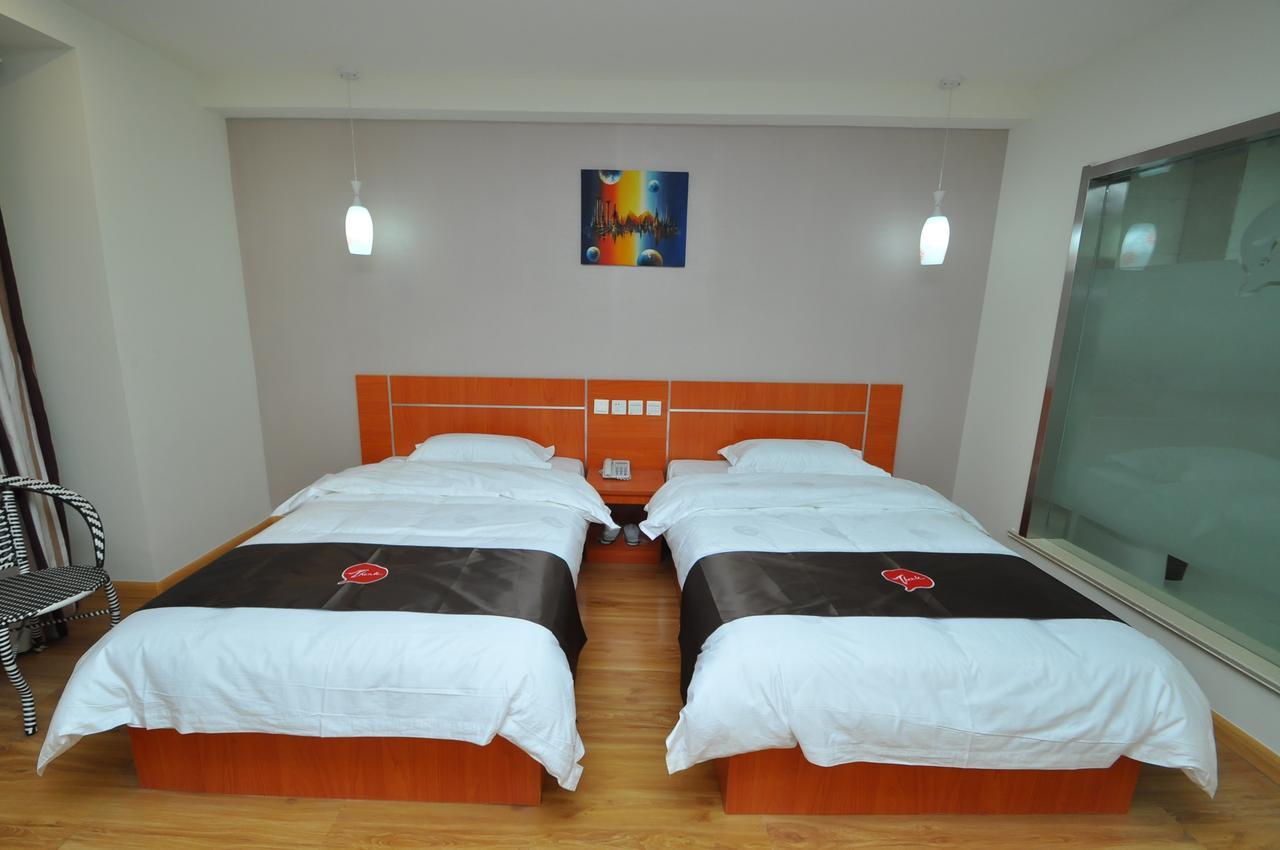 Thank Inn Chain Hotel West Eleven Road Mall Linyi  Zewnętrze zdjęcie